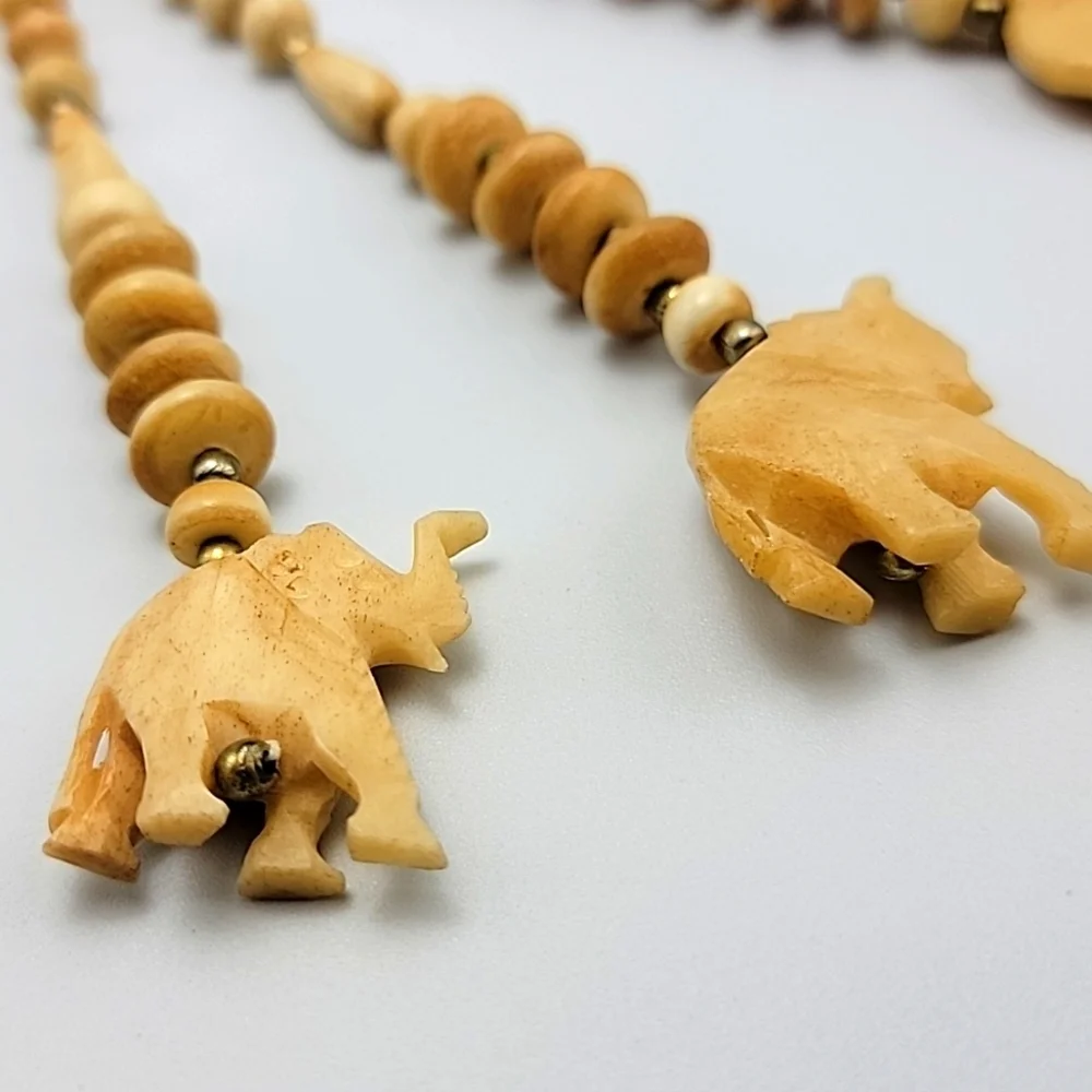 VTG Statement Tribal Bone Bovine Elephant Charm Beaded Gold Tone Necklace Ethnic